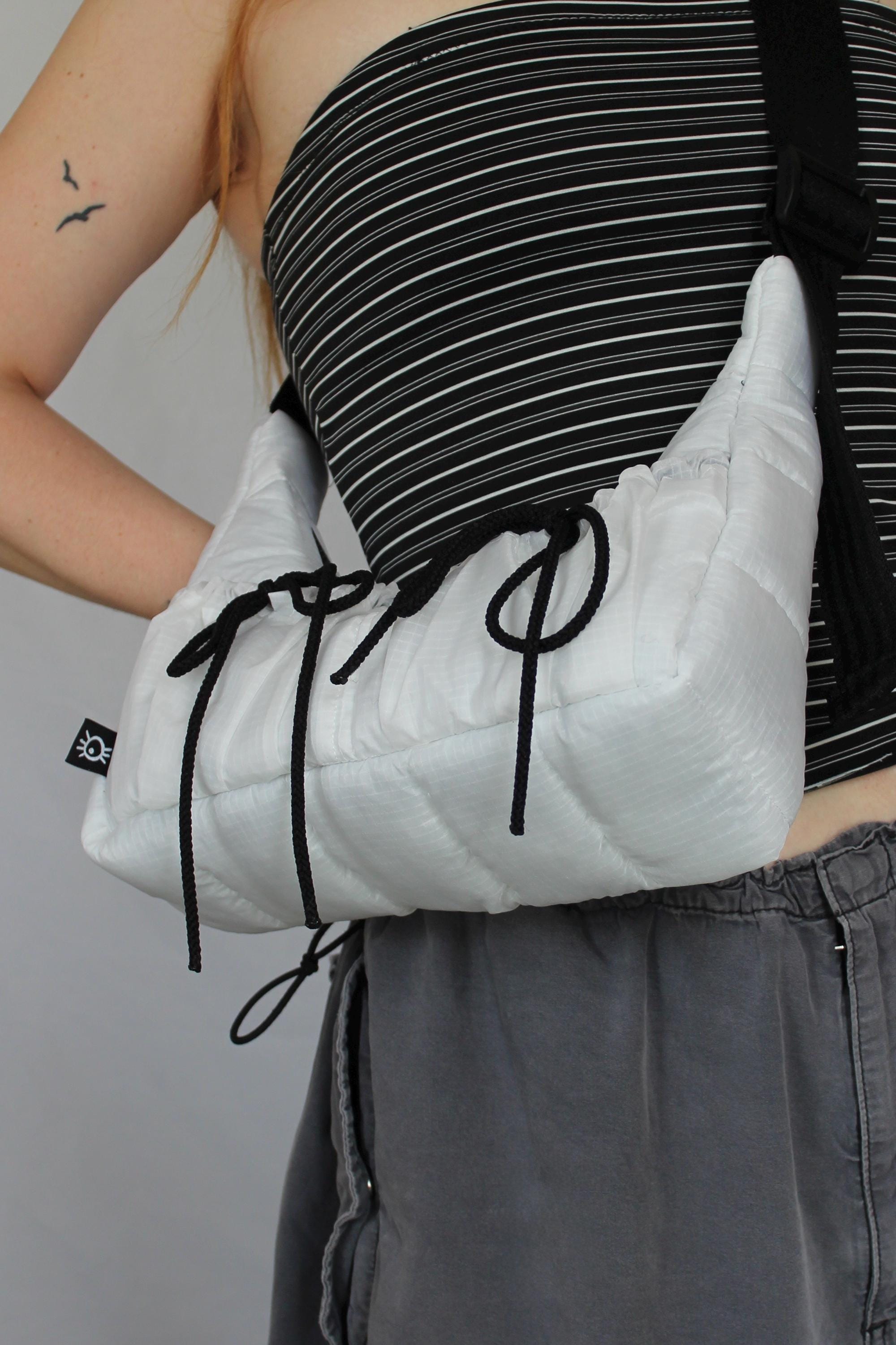 Sustainable hot air balloon offcuts bow shoulder bag with back pocket detail