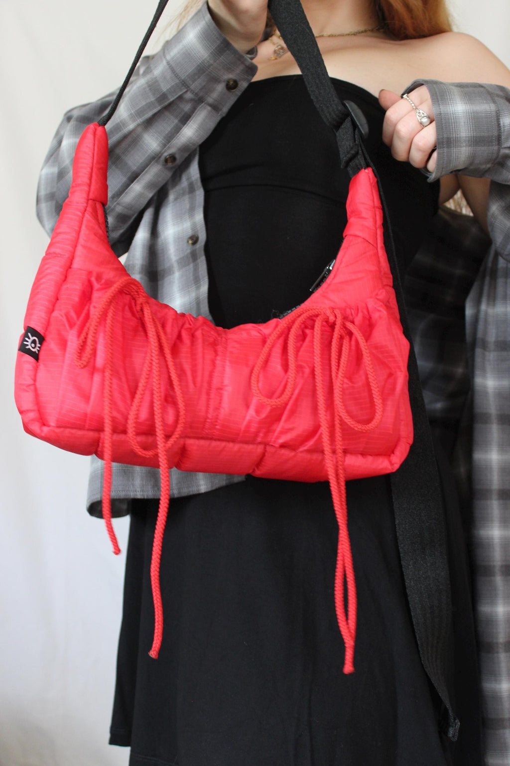 Sustainable hot air balloon offcuts bow shoulder bag with back pocket detail