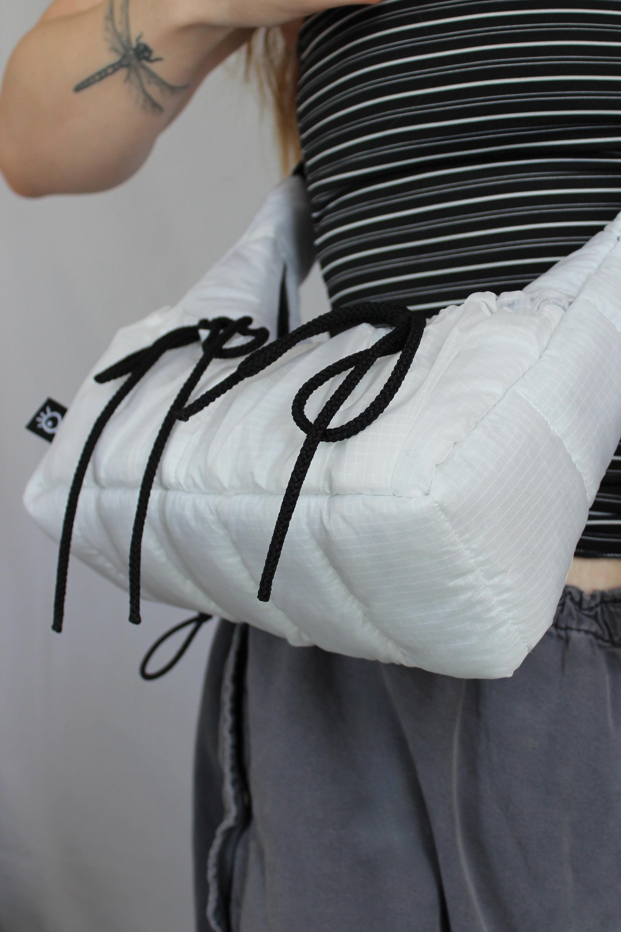 Sustainable hot air balloon offcuts bow shoulder bag with back pocket detail