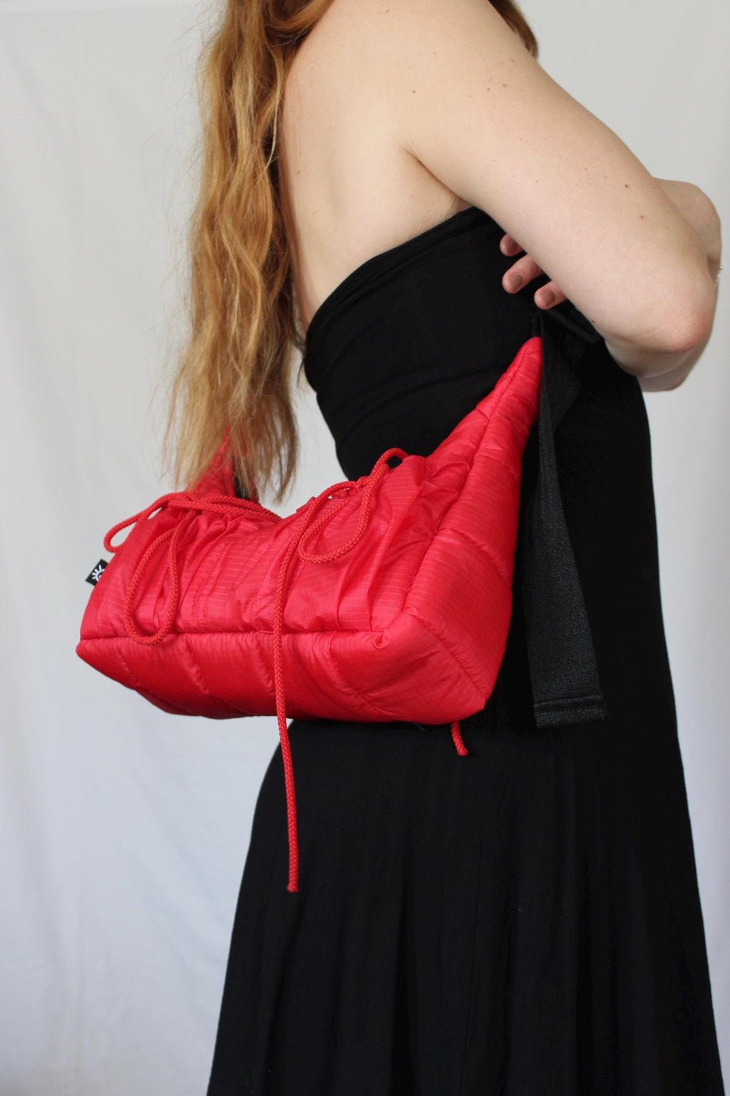 Sustainable hot air balloon offcuts bow shoulder bag with back pocket detail