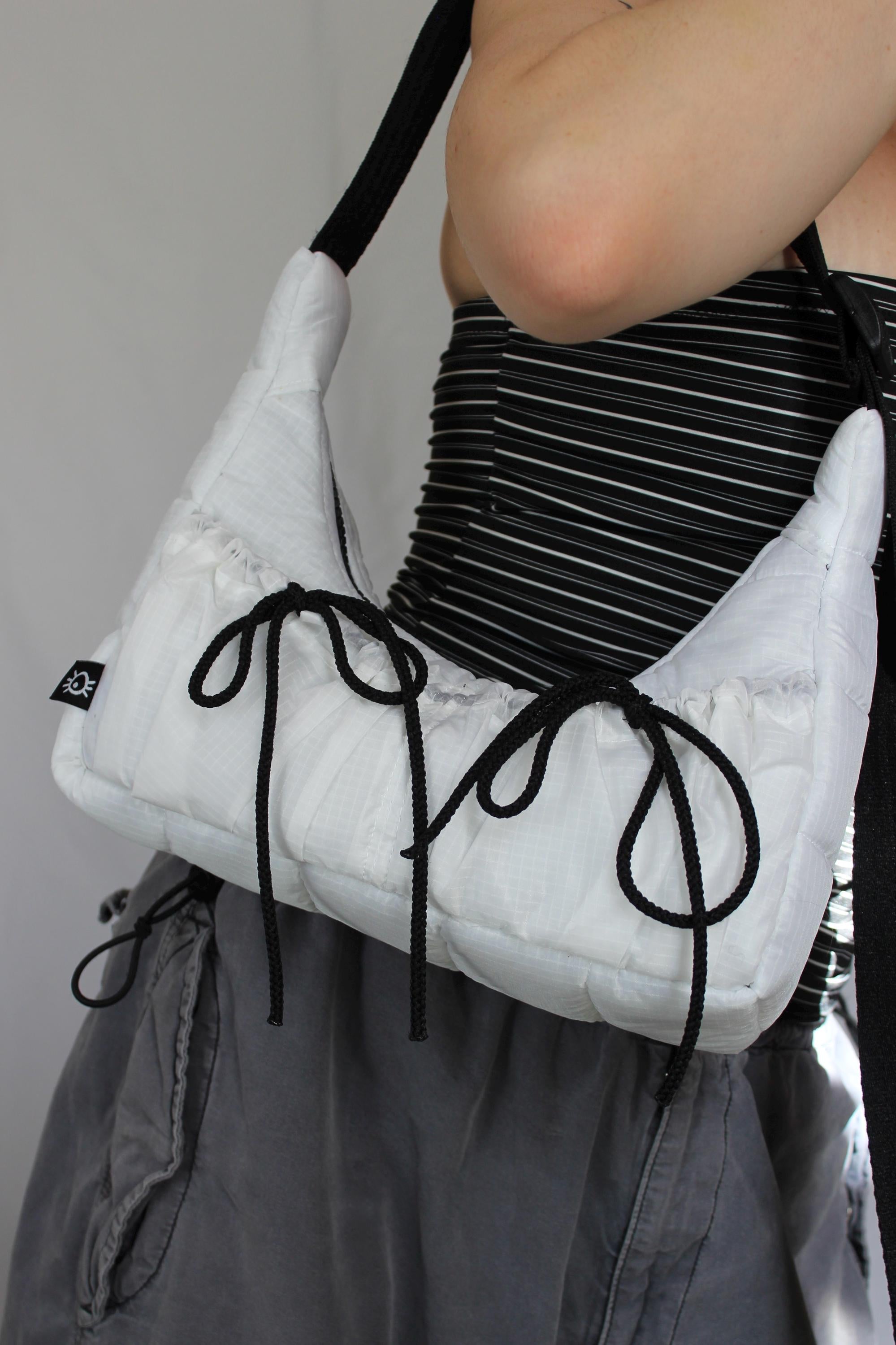 Sustainable hot air balloon offcuts bow shoulder bag with back pocket detail