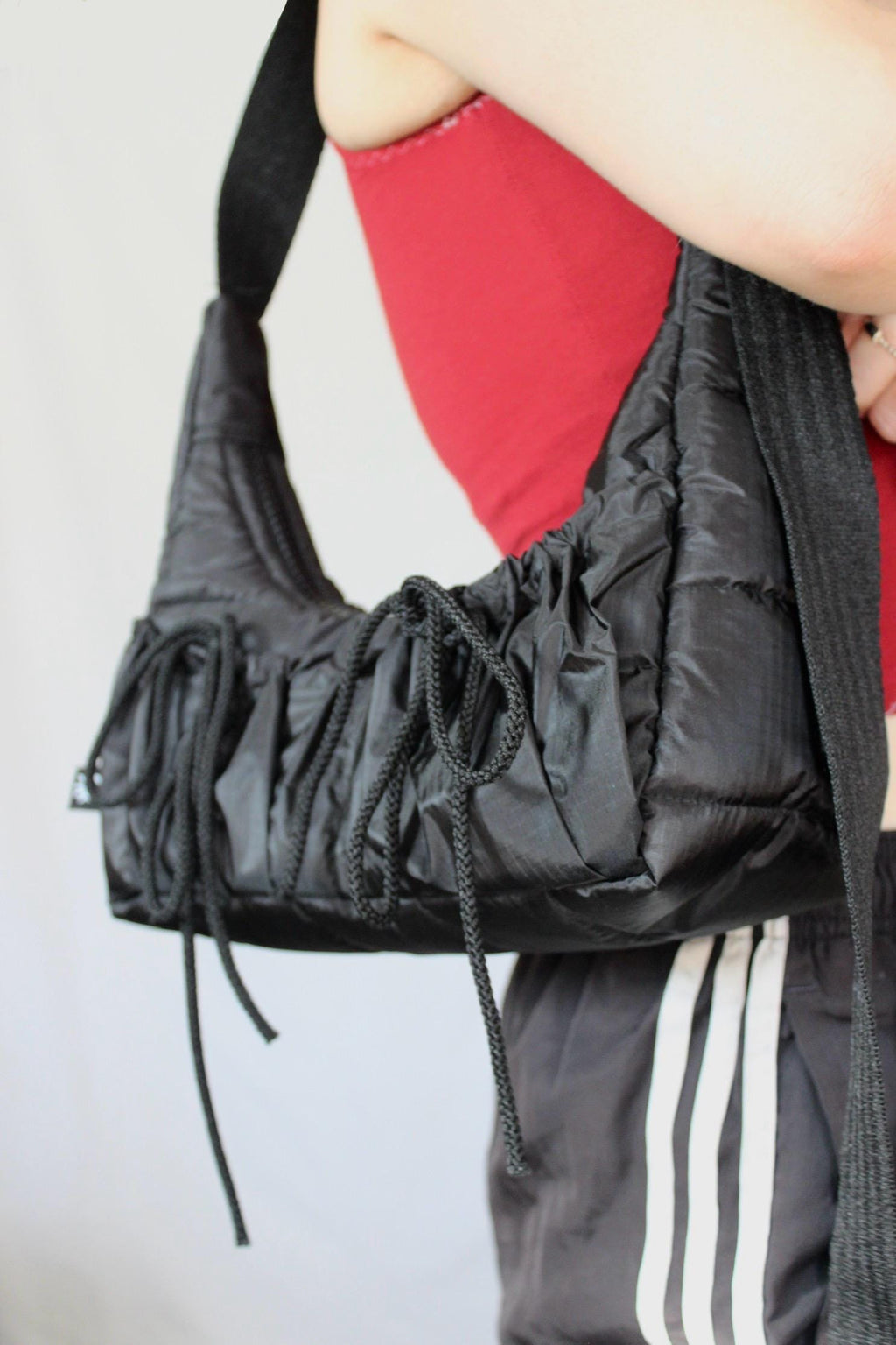 Sustainable hot air balloon offcuts bow shoulder bag with back pocket detail