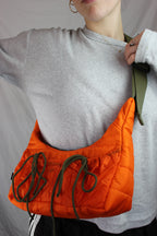 Orange puffer style with drawstring bows Upcycled hot air balloon bags, made in bristol