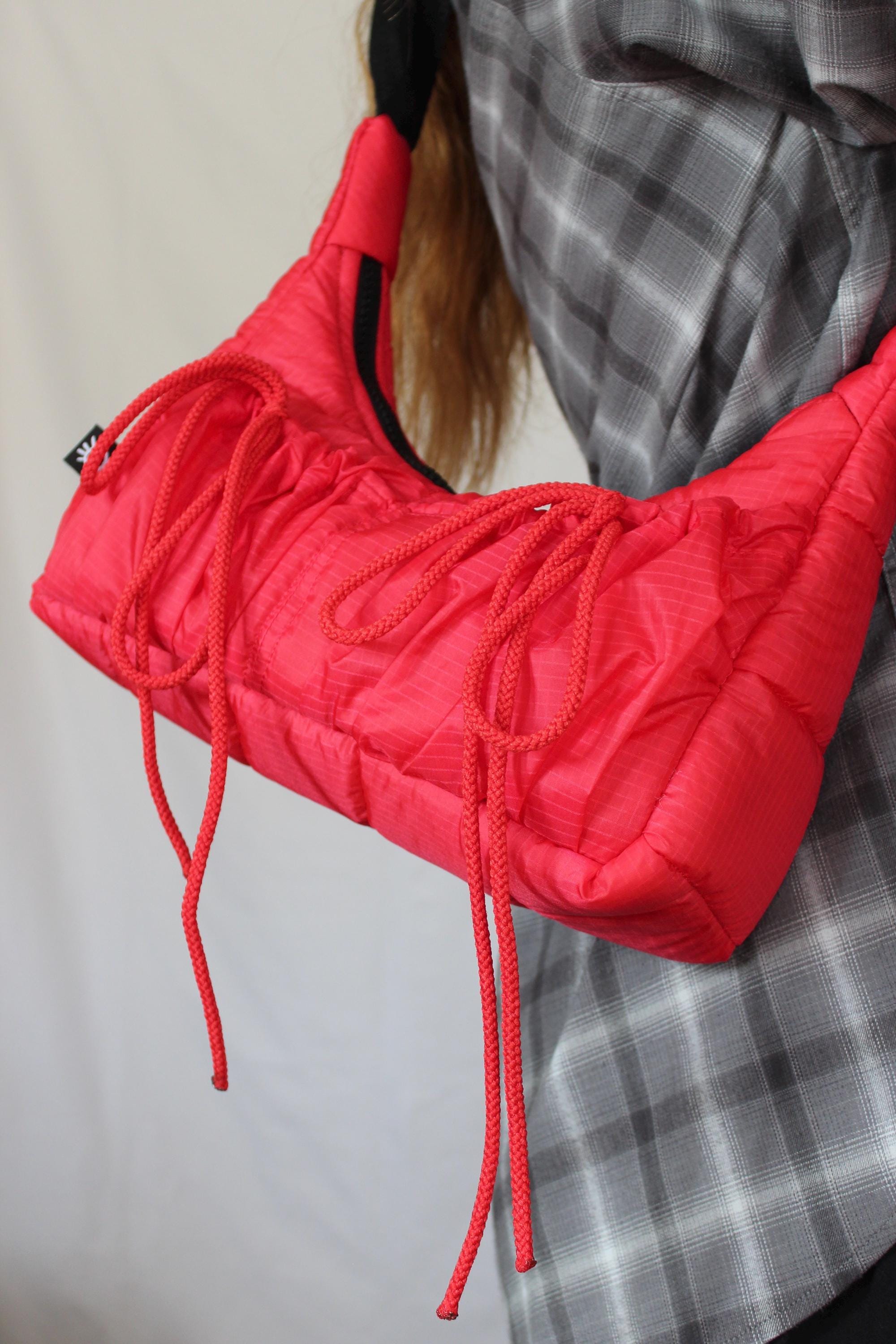 Sustainable hot air balloon offcuts bow shoulder bag with back pocket detail