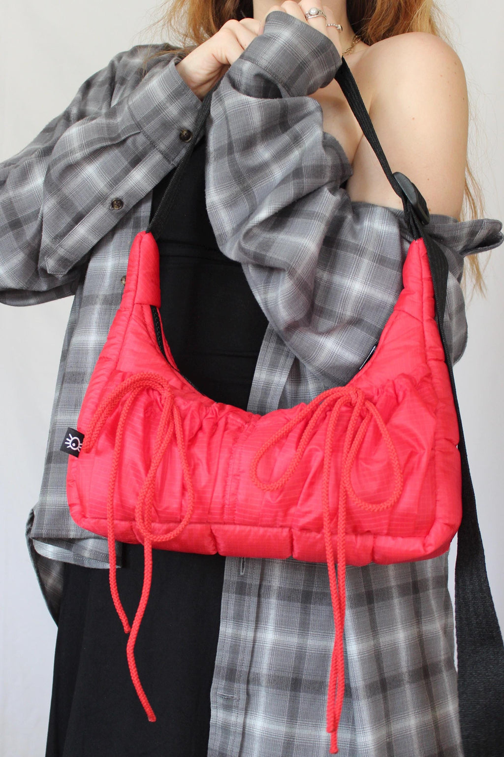 Sustainable hot air balloon offcuts bow shoulder bag with back pocket detail