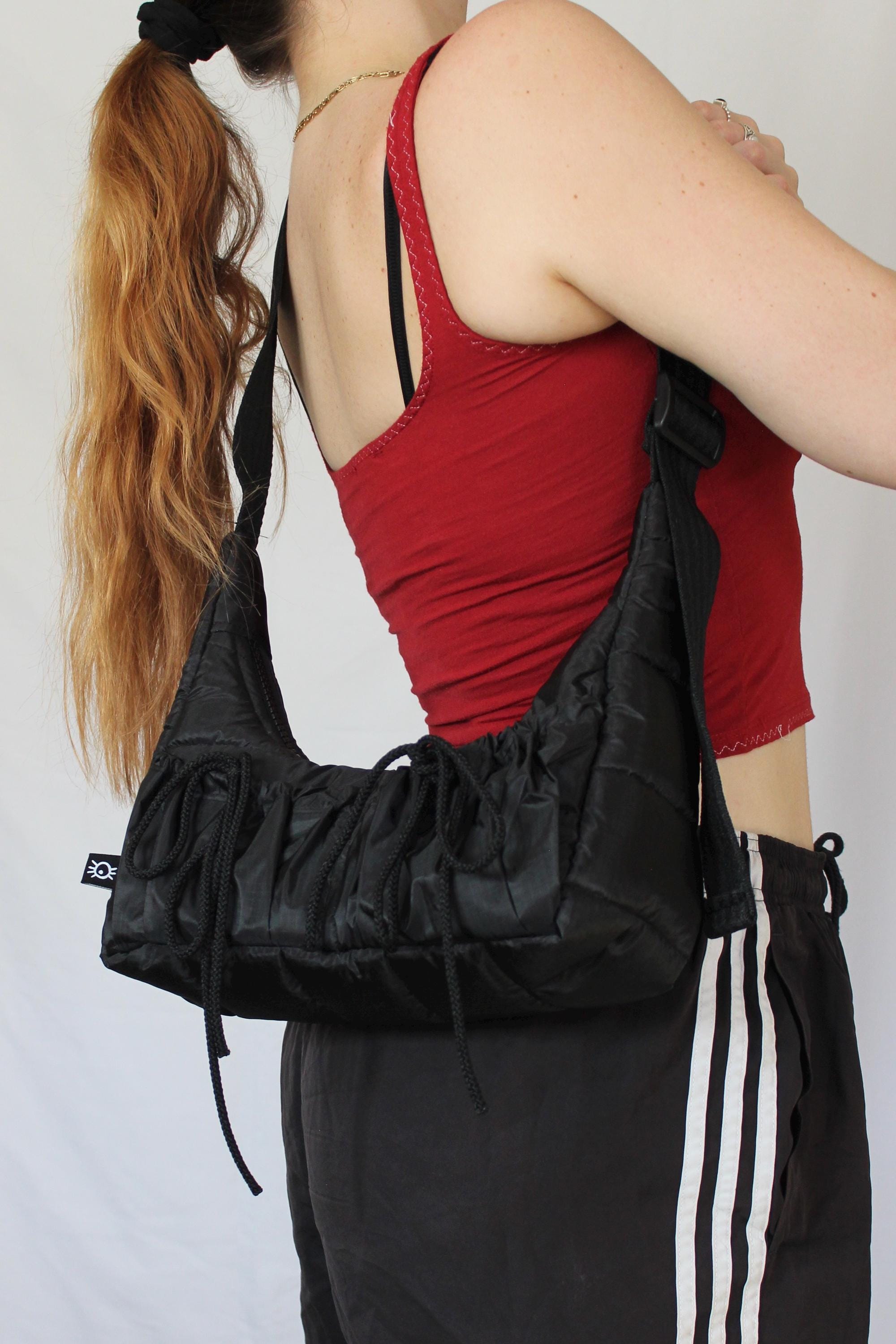 Sustainable hot air balloon offcuts bow shoulder bag with back pocket detail